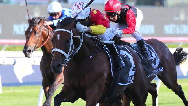 Militarize wins the Group 1 Champagne Stakes at Randwick.