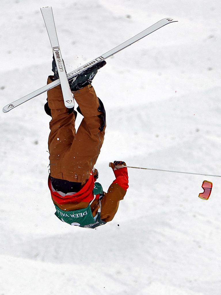 George McQuinn flips during his moguls run. (Photo by Ezra Shaw/Getty Images)