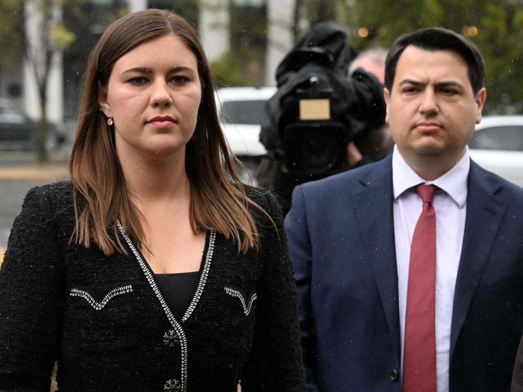 Brittany Higgins and partner David Sharaz outside court in Canberra in October. Picture: AAP Image/Mick Tsikas