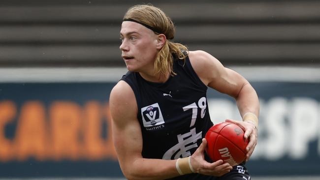 MELBOURNE, AUSTRALIA - MAY 06: Harley Reid of Carlton runs with the ball during the round seven VFL match between Carlton Blues and Brisbane Lions at Ikon Park on May 06, 2023 in Melbourne, Australia. (Photo by Darrian Traynor/AFL Photos/via Getty Images)