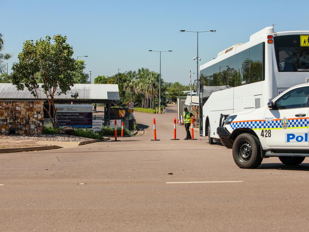 Passengers from the Qantas flight arrive by bus at the Howard Springs facility. Picture: Steven Hoare/Getty Images