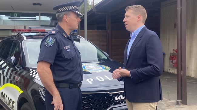 Assistant police commissioner Ian Parrott and minister Joe Szakacs discussing road safety laws at a press conference on Saturday.