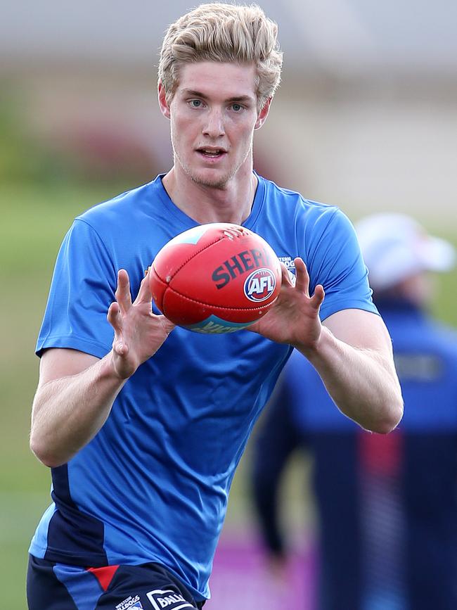 Tim English receives a handball. Pic: Michael Klein