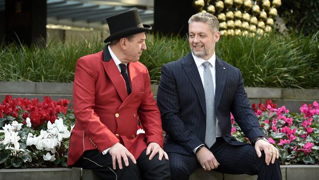 Crown Resorts CEO Ciaran Carruthers with door person Vincenzo Iaconis at Crown Casino in Melbourne. Picture: NCA NewsWire / Andrew Henshaw