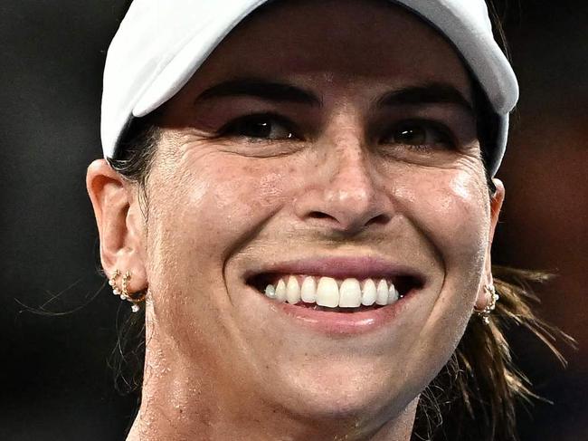 Australia's Ajla Tomljanovic waves as she leaves the court after victory against Croatia's Petra Martic in their women's singles match on day three of the Australian Open tennis tournament in Melbourne on January 17, 2024. (Photo by Lillian SUWANRUMPHA / AFP) / -- IMAGE RESTRICTED TO EDITORIAL USE - STRICTLY NO COMMERCIAL USE --