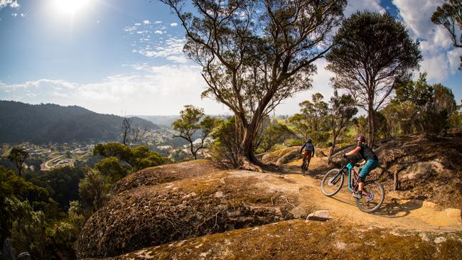 Located in temperate rainforest in northeast Tasmania, the Blue Derby Mountain Bike Trails encompass some of the most stunning landscapes in Tasmania. Picture: Tourism Tasmania