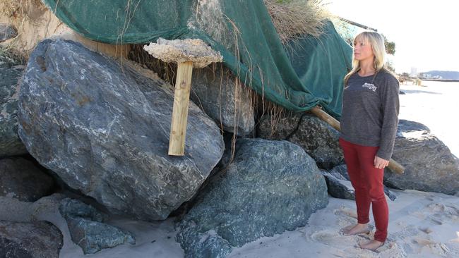 Sand Erosion at Palm Beach , pictured at the Ocean end of Palm Beach Avenue Palm Beach local Nikki Dee looking over the king tides beach erosion .