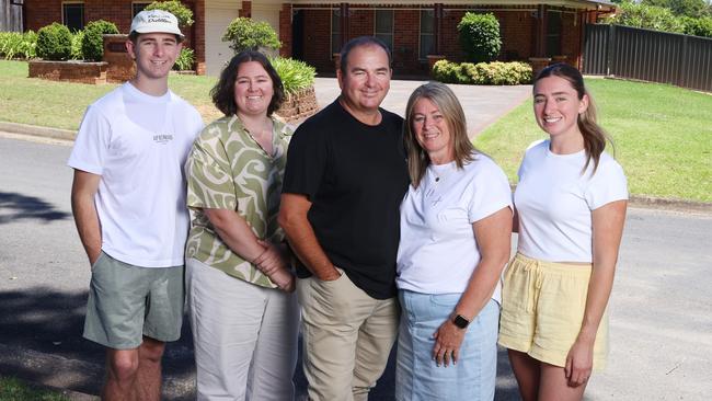 Gary and Kellie Osgood with their children Kane, Kara and Abbey. The couple purchased their block of land in Appin back in 1995 for $73,000 and built their family home, which they have just sold for $1.24m. Picture: John Feder