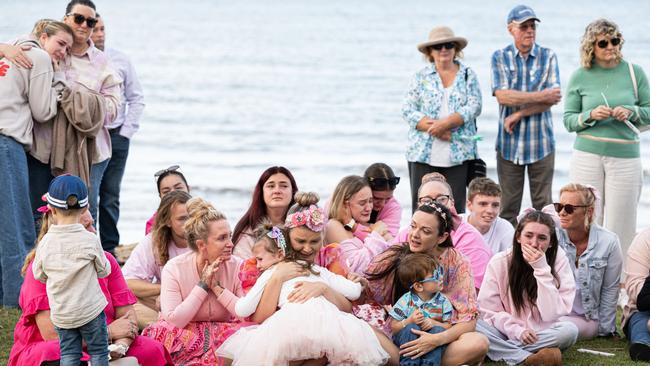 People gather to remember Sophia Rose. Libby French & Kristielle Burrage from Kids & Co console each other. Photo: Paul Beutel