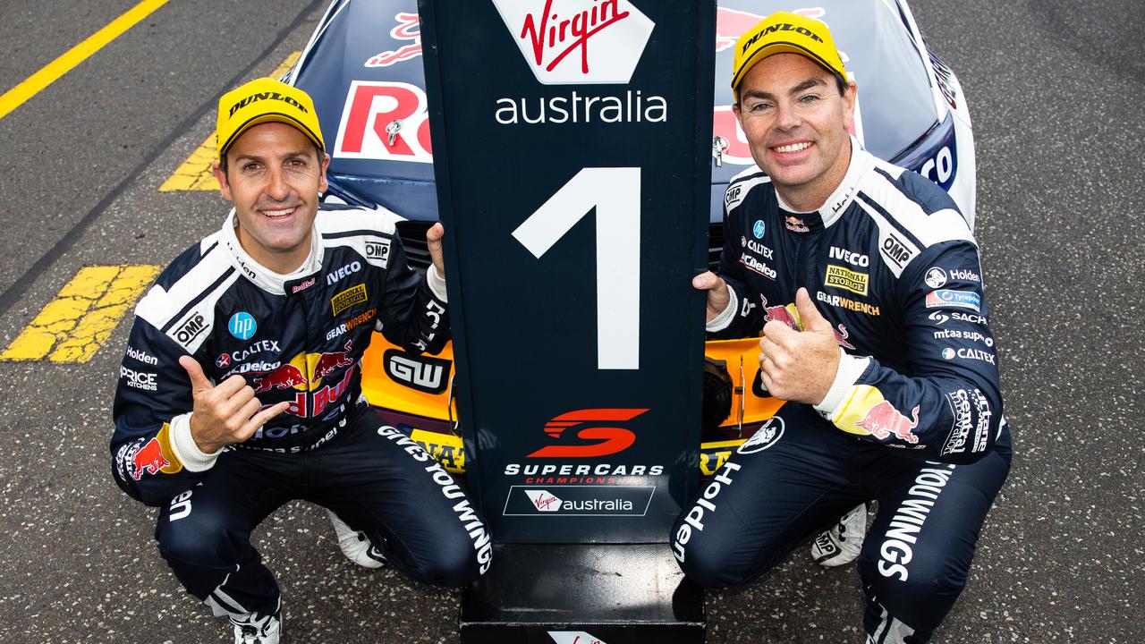 Jamie Whincup and Craig Lowndes celebrate after winning the Sandown 500. Picture: Daniel Kalisz