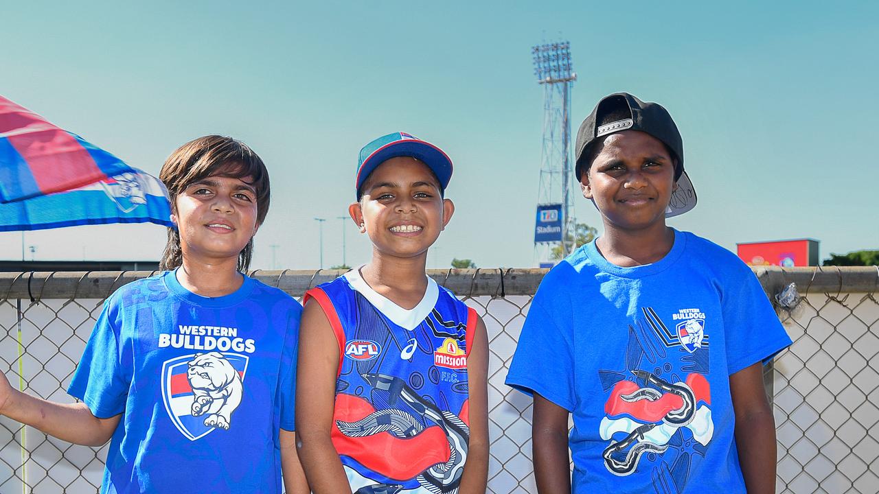 Clayton Wilson, Tyreece Wilson and Nick Farell barracking for the Western Bulldogs vs the Gold Coast Suns at TIO Stadium. Picture: Pema Tamang Pakhrin