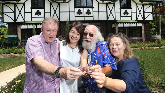 Tamborine Mountain Distillery owners Gordon Chalmers and Shumei Hou and founders Michael and Alla Ward toasting the sale. Picture Glenn Hampson