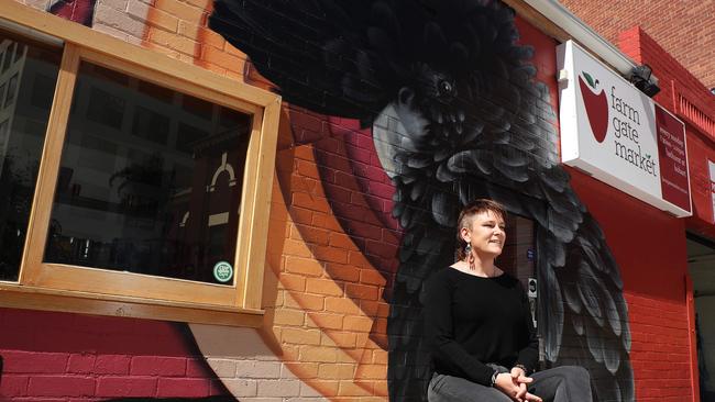 Farm Gate market boss Madi Seeber-Peattie in front of their offices in Bathurst Street. Picture: LUKE BOWDEN