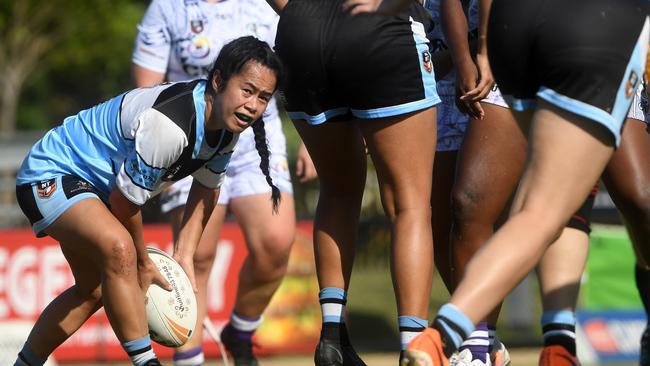 Northern Sharks' player takes on Darwin Brothers' women in the Humpty Dumpty Foundation round of 2022 NRLNT season. Picture: (A)manda Parkinson