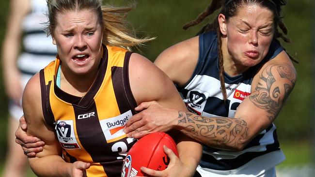 Tayah Kelly is tackled by Geelong’s Richelle Cranston Picture: Mark Dadswell