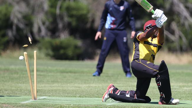 Sunbury United batsman Rajitha Mendis is clean bowled. Picture: Stuart Milligan