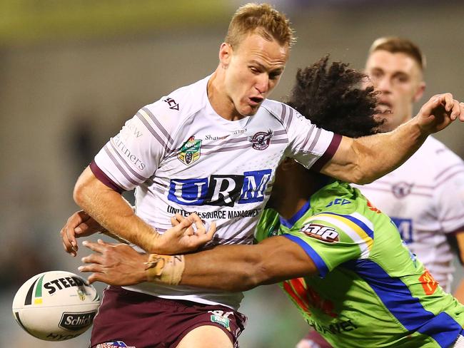 CANBERRA, AUSTRALIA - MAY 25:  Daly Cherry-Evans of the Eagles loses the ball in a tackle during the round 12 NRL match between the Canberra Raiders and the Manly Sea Eagles at GIO Stadium on May 25, 2018 in Canberra, Australia.  (Photo by Mark Nolan/Getty Images)