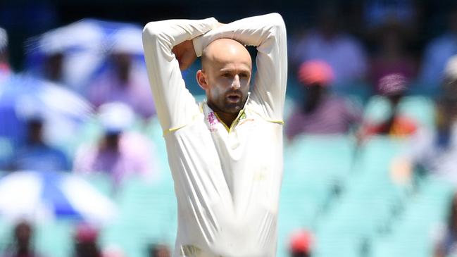 Nathan Lyon of Australia reacts after Usman Khawaja dropped a catch in the slips on day two of the Fourth Test match between Australia and India at the SCG in Sydney, Friday, January 4, 2019. (AAP Image/Dan Himbrechts) NO ARCHIVING, EDITORIAL USE ONLY, IMAGES TO BE USED FOR NEWS REPORTING PURPOSES ONLY, NO COMMERCIAL USE WHATSOEVER, NO USE IN BOOKS WITHOUT PRIOR WRITTEN CONSENT FROM AAP