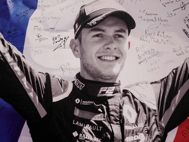 TOPSHOT - This picture taken on September 1, 2019 shows the portrait of BWT Arden's French driver Anthoine Hubert covered with condolence messages at the entrance of the Spa-Francorchamps circuit in Spa, Belgium. - French driver Anthoine Hubert, 22, was killed on August 31 in Spa in an accident during a Formula 2 race held on the sidelines of the F1 Grand Prix, according to organizers of the race. (Photo by Kenzo TRIBOUILLARD / AFP)