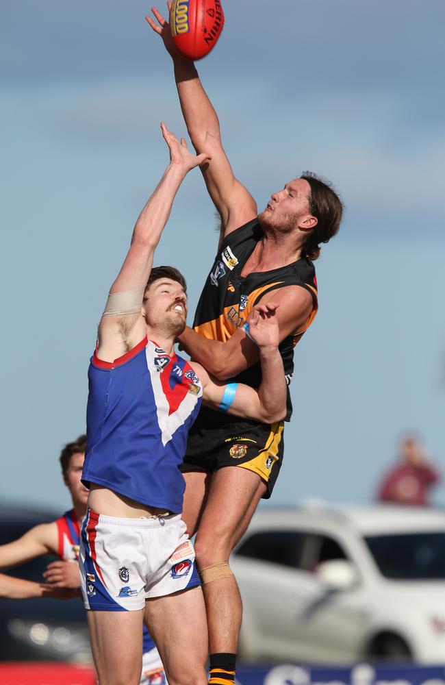 GFL:Senior Football Grovedale v South Barwon.Grovedale 1 Mitchell Fisher gets the tap out over South Barwon 6 Luke DavisPicture: Mark Wilson