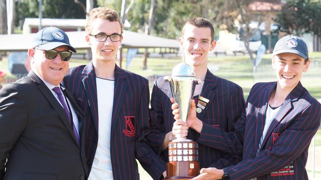 Brisbane State High School executive principal Wade Haynes with cross country leaders celebrating the win. Picture: Lizel Moore