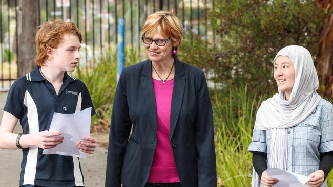 Year 9 Students Caellum, 15 and Fatimah, 14, with Salisbury East High School principal Kristen Masters discussing their NAPLAN results. Image/Russell Millard Photography