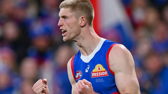 GEELONG, AUSTRALIA - AUGUST 26: Tim English of the Bulldogs celebrates a goal during the round 24 AFL match between Geelong Cats and Western Bulldogs at GMHBA Stadium, on August 26, 2023, in Geelong, Australia. (Photo by Morgan Hancock/Getty Images)