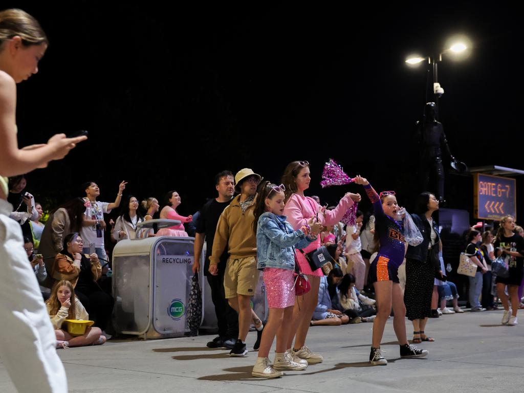 "Swifties" sing and dance during the concert outside the MCG.