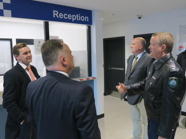 Brisbane Water Supt. Tony Joyce leading Police Minister David Elliott, Terrigal State Liberal MP Adam Crouch and Upper House Liberal MLC Taylor Martin through Gosford Police Station. Picture: Richard Noone