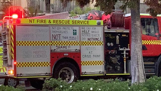 NT Firefighters have been writing slogans on their firetrucks as part of a protected industrial action during ongoing EBA negotiations. Picture: Supplied.