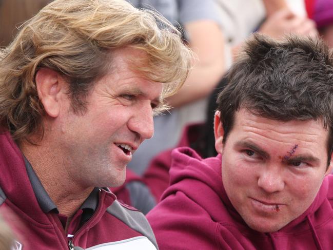 Coach Des Hasler (L) and co captain Jamie Lyon as Manly Sea Eagles players and officials are welcomed at a civic reception hosted by Manly City Council in Sydney after team's victory in 2011 NRL Grand Final.