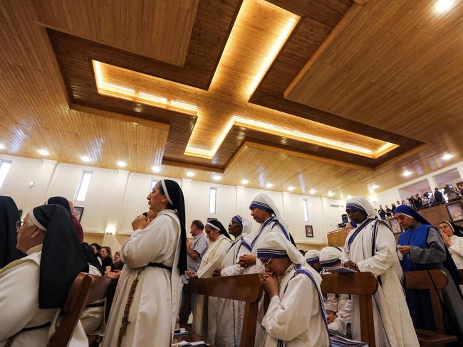A Christian nun prays during a memorial mass for the late Pope Francis at the Chaldean Catholic Church of St Joseph in Baghdad. Picture: AFP