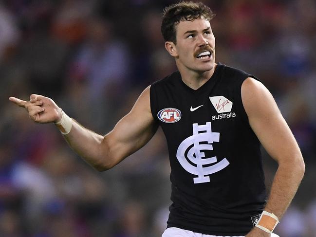 Mitch McGovern of the Blues (right) reacts after kicking a goal during the Round 5 AFL match between the Western Bulldogs and the Carlton Blues at Marvel Stadium in Melbourne, Sunday, April 21, 2019. (AAP Image/Julian Smith) NO ARCHIVING, EDITORIAL USE ONLY