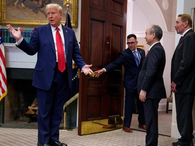 WASHINGTON, DC - JANUARY 21: U.S. President Donald Trump, accompanied by (R-L) , OpenAI CEO Sam Altman, SoftBank CEO Masayoshi Son, and Oracle CTO Larry Ellison speaks as he leaves a news conference in the Roosevelt Room of the White House on January 21, 2025 in Washington, DC. Trump announced an investment in artificial intelligence (AI) infrastructure and took questions on a range of topics including his presidential pardons of Jan. 6 defendants, the war in Ukraine, cryptocurrencies and other topics. (Photo by Andrew Harnik/Getty Images)