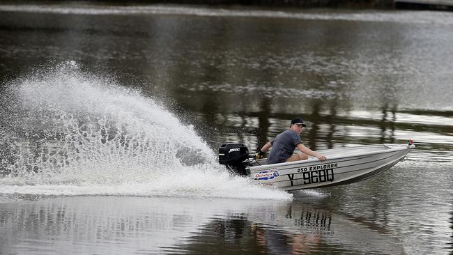 A young tinnie operator on the Coomera River. Photo: Jerad Williams