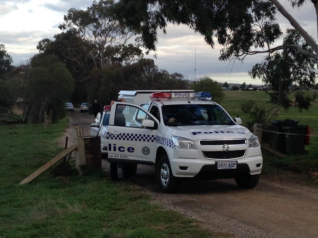 Police at the house in Hillier, in Adelaide’s north, on the day the three bodies were found. Picture: Sam Wundke