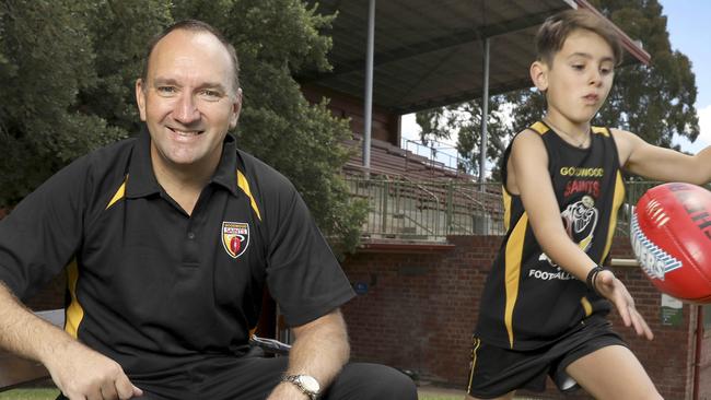 Goodwood Saints footy director Daniel Norton pictured with son and Goodwood junior Harrison. Norton believes the system of youth and community culture at the Saints has them primed for another premiership season. Picture: Dean Martin