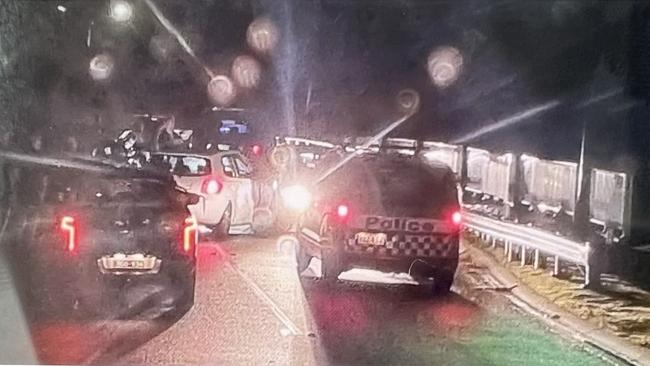 The scene at Riverlinks in Helensvale in the early hours of the morning on Thursday April 27 after residents used their own vehicles to block the escape of alleged thieves.