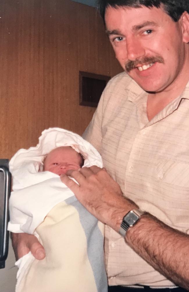 Cate Smith cradled by late father Jeff. Pic Supplied.