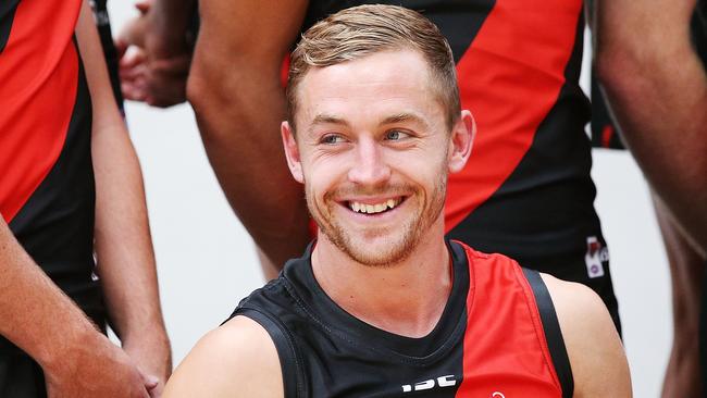 Former GWS star Devon Smith gets prepared for the Essendon team photo. Picture: Getty Images