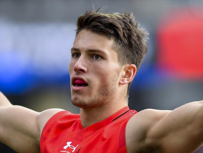 ADELAIDE, AUSTRALIA - MAY 07: Archie Perkins of the Bombers celebrates a goal during the round eight AFL match between Port Adelaide Power and Essendon Bombers at Adelaide Oval, on May 07, 2023, in Adelaide, Australia. (Photo by Mark Brake/Getty Images)