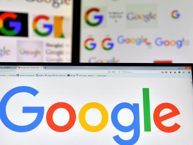 (FILES) A file photo taken on November 20, 2017 shows logos of US multinational technology company Google displayed on computers' screens. - Google is dropping out of the bidding for a huge Pentagon cloud computing contract that could be worth up to $10 billion, saying the deal would be inconsistent with its principles. The decision by Google, confirmed to AFP in an email October 9, 2018, leaves a handful of other tech giants including Amazon in the running for the Joint Enterprise Defense Infrastructure (JEDI) contract aimed at modernizing the military's computing systems. (Photo by LOIC VENANCE / AFP)