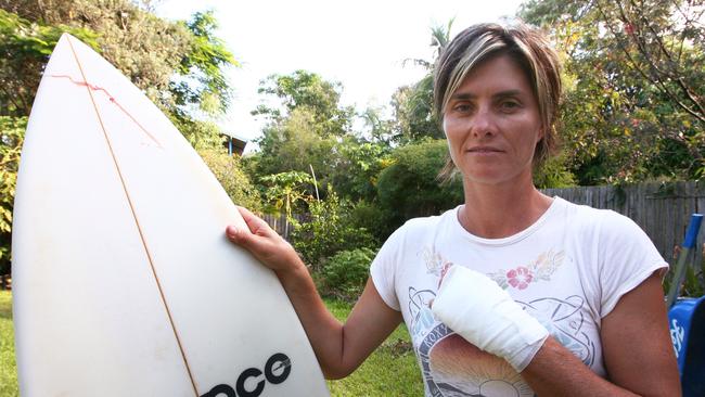 Jodie Cooper had a close call with a small shark when her hand went into its mouth while surfing at South Golden Beach in 2007.