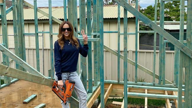 Interior designer Kyly Clarke on the site of one of her projects.