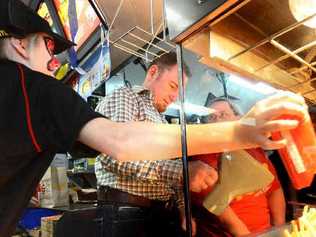 Coffs Coast Advocate general manager Brent Rees manhandles the chip baskets at McDonalds Coffs Harbour South. Picture: Leigh Jensen