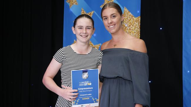 Jade Rose Errington accepting her Junior Sports Star award from the Liverpool Leader.