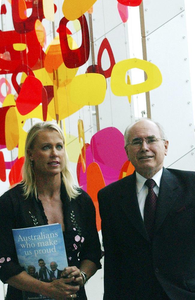 Before the crock shock … Prime Minister John Howard and Lisa Curry the launch of the 2004 Australian of the Year Awards in July 2003.