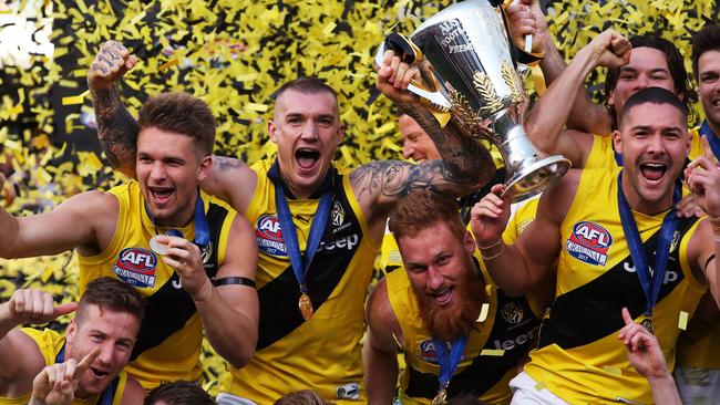 Dustin Martin leads Richmond’s premiership celebrations last year. Picture: Phil Hillyard