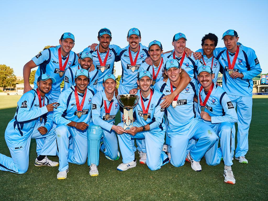 New South Wales players celebrate their victory.