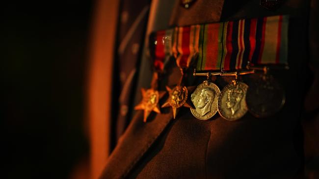 Medals are seen on WWII veteran Jack Hair.